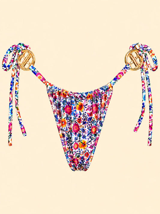 Floral reverse of adjustable Cyan bikini bottom with gathered fabric and side ties